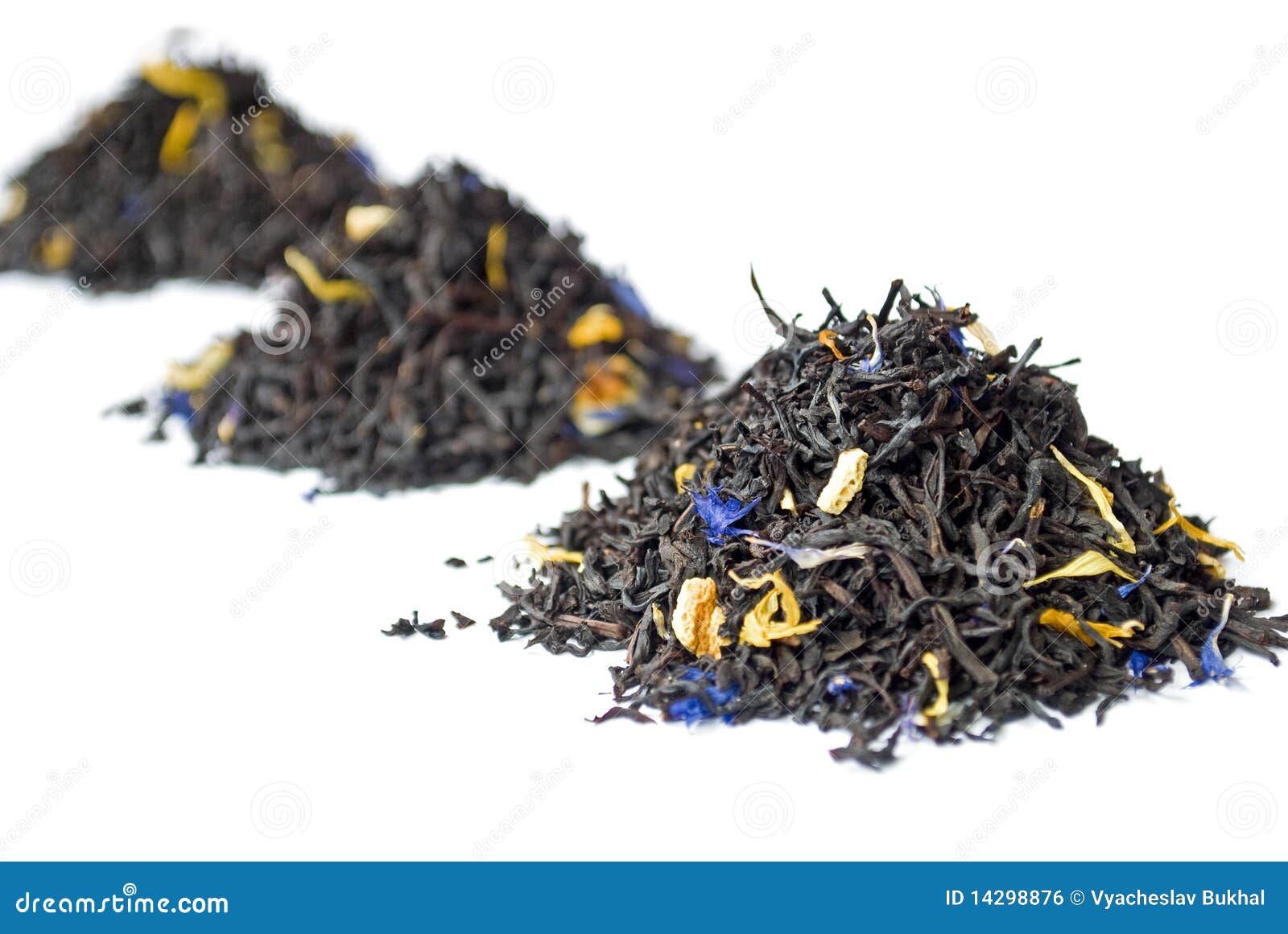 3 heaps of black earl grey tea  on white