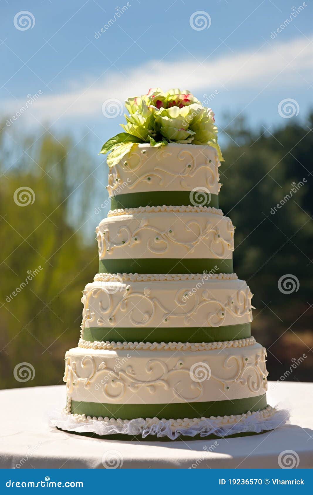 A 4 Tier  Wedding  Cake  In A  Garden Setting Stock Photo 