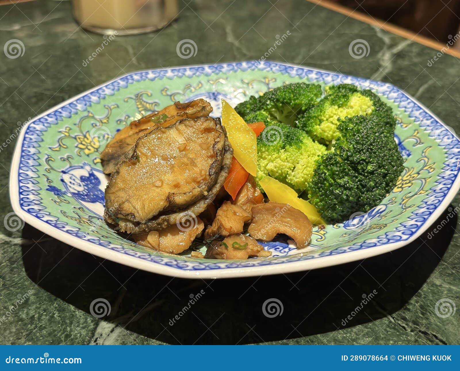 Abalone with Broccoli Served in a Dish. Chinese Cuisine. Close Up. Stock Photo Image of