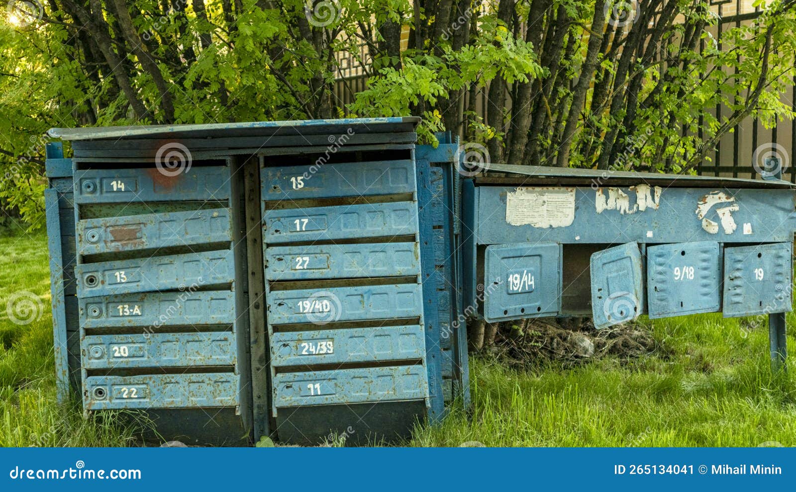 Abandoned Blue Mailboxes in Green Grass Stock Image Image of farm
