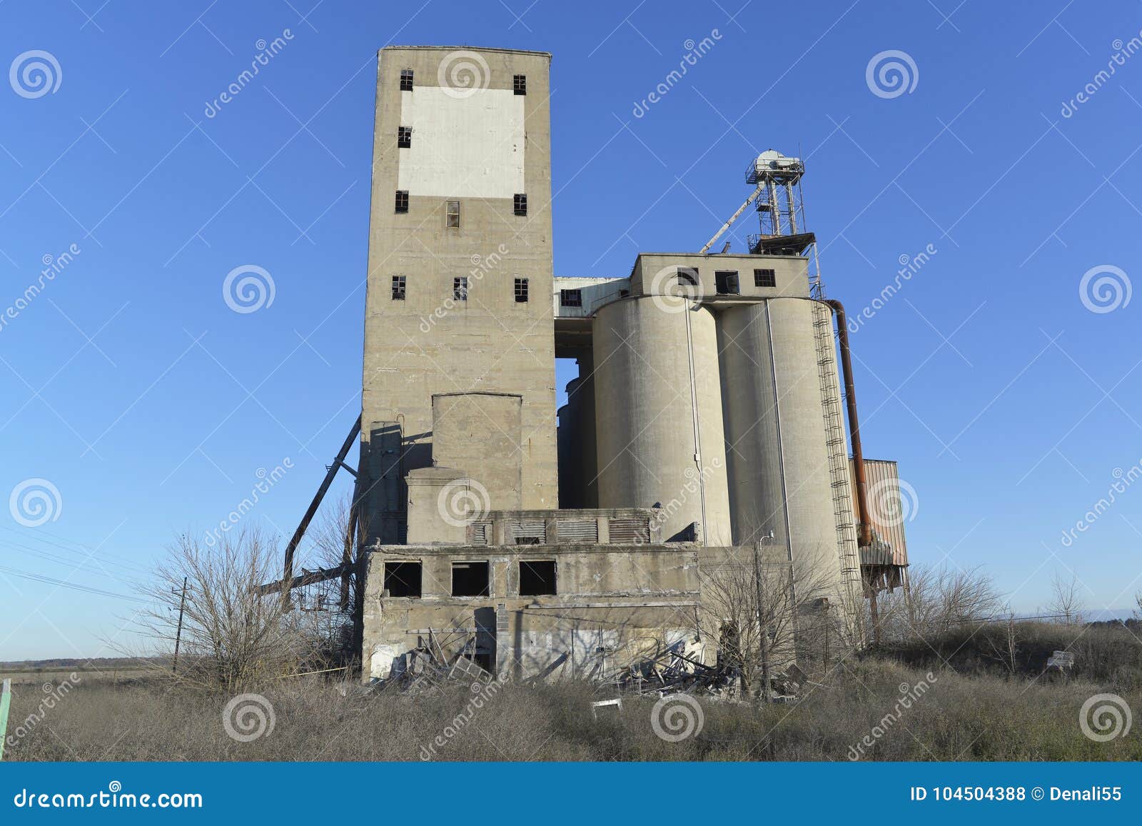 Abandoned grain elevator. stock photo. Image of field 104504388