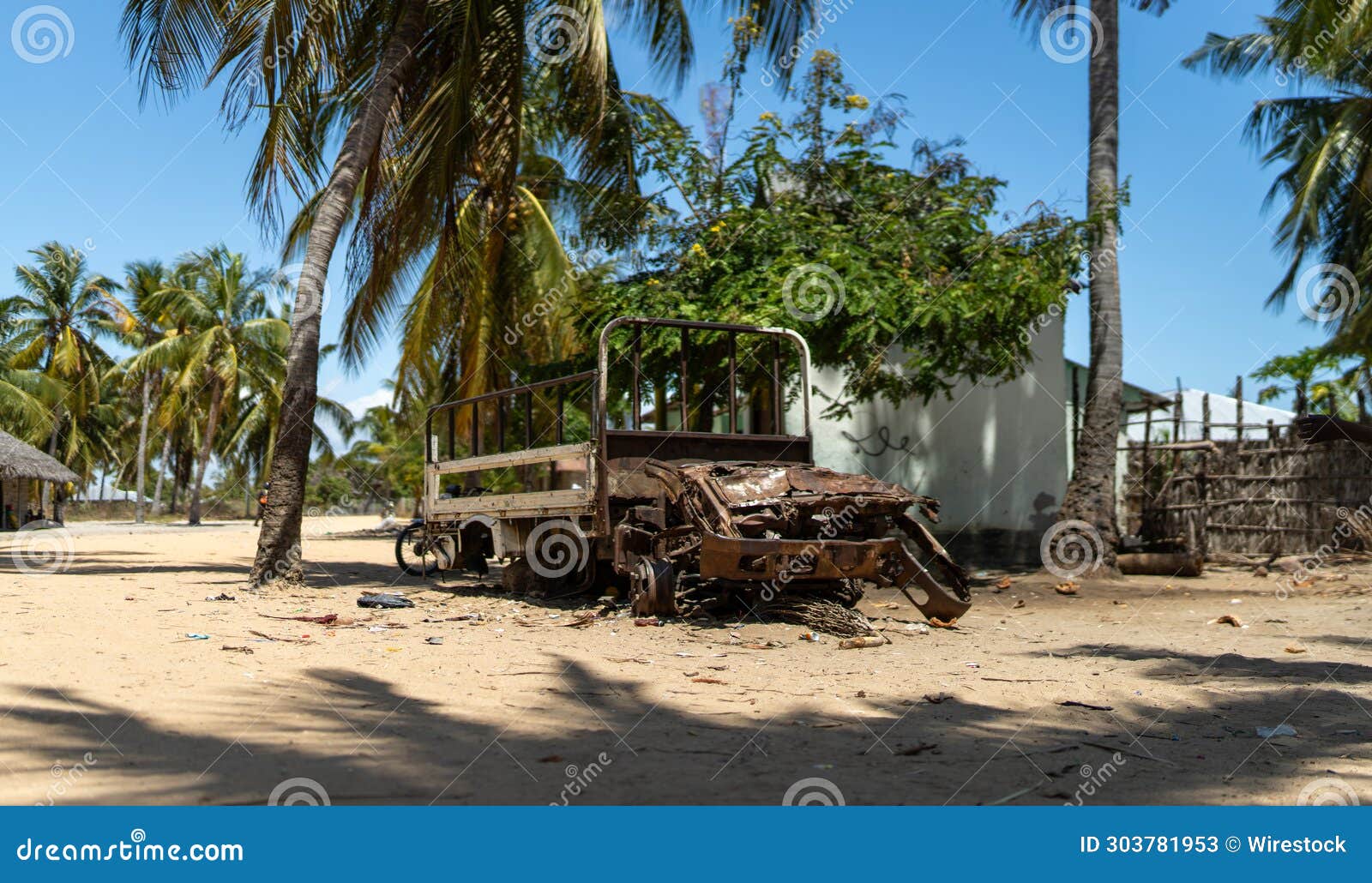 abandoned and destroyed car in mocimboa da praia in cabo delgado, mozambique