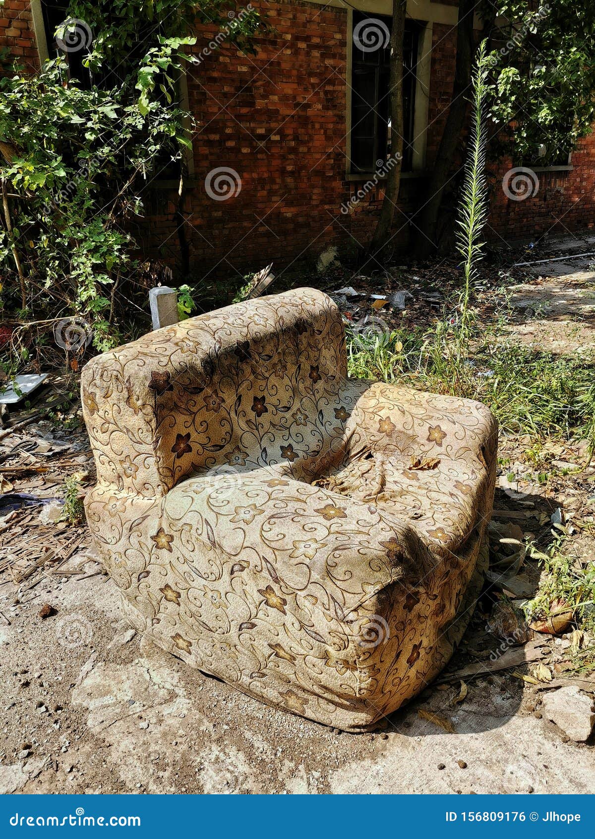 Abandoned Old Sofa Against Red Brick Wall Stock Photo Image of wall