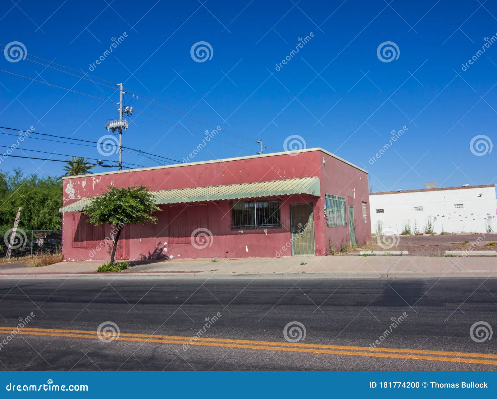 Abandoned Pink Building with Window Bars Stock Photo Image of peeling