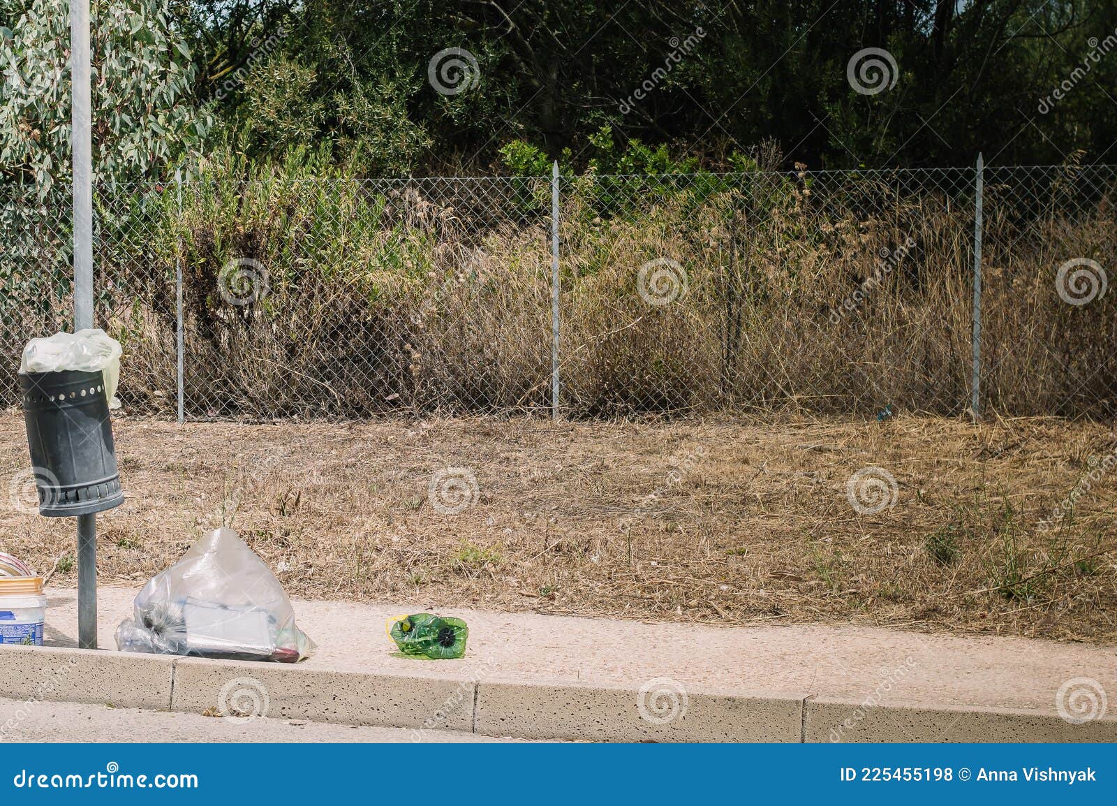 Abandoned Plastic Bags of Garbage on the Road.Environmental Pollution