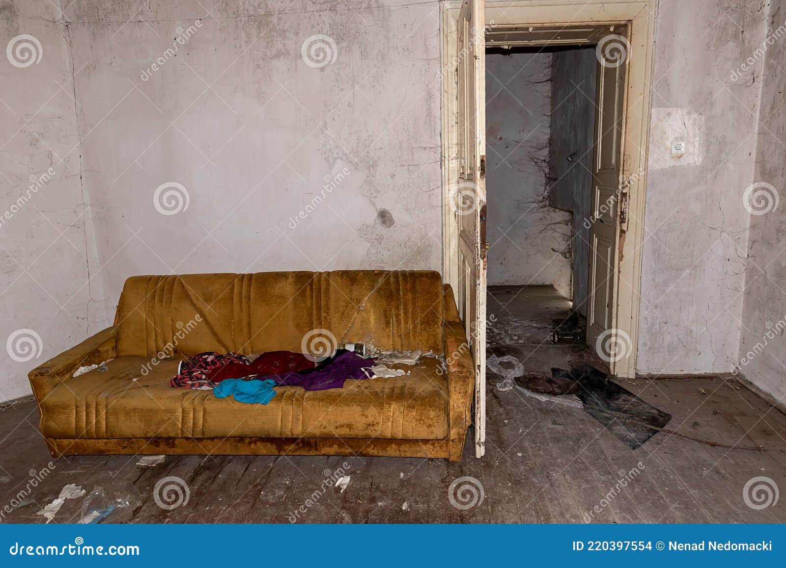 Abandoned Ruin House an Empty Bed. Abandoned Bedroom Stock Photo