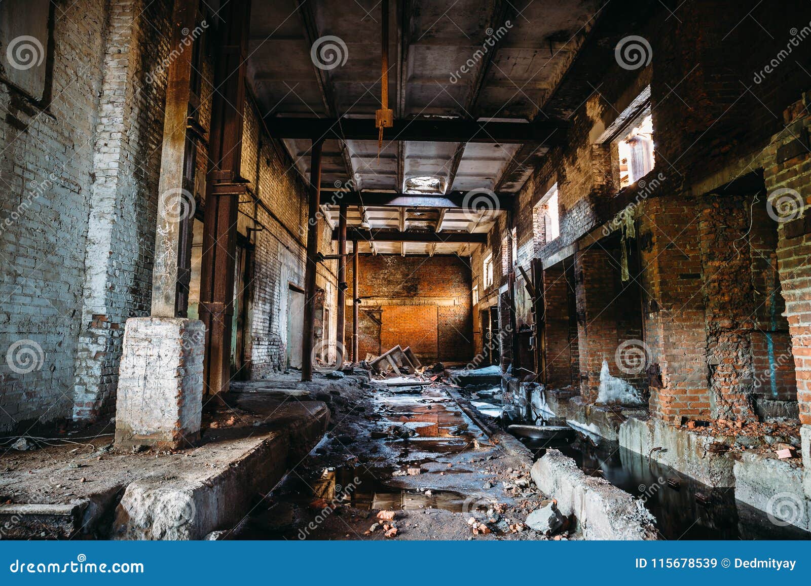 abandoned ruined industrial factory building, corridor view with perspective, ruins and demolition concept