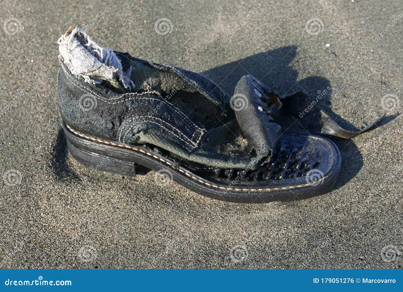 Abandoned shoe shore stock photo. Image of object, sand - 179051276