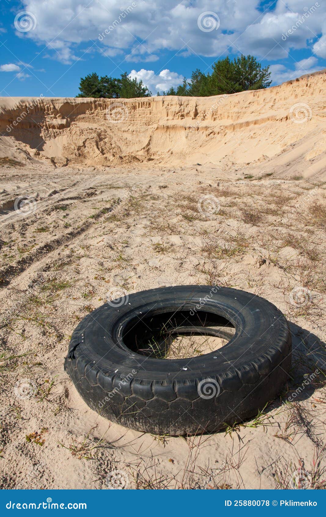 Abandoned tire on sandy stock photo. Image of mountain 25880078