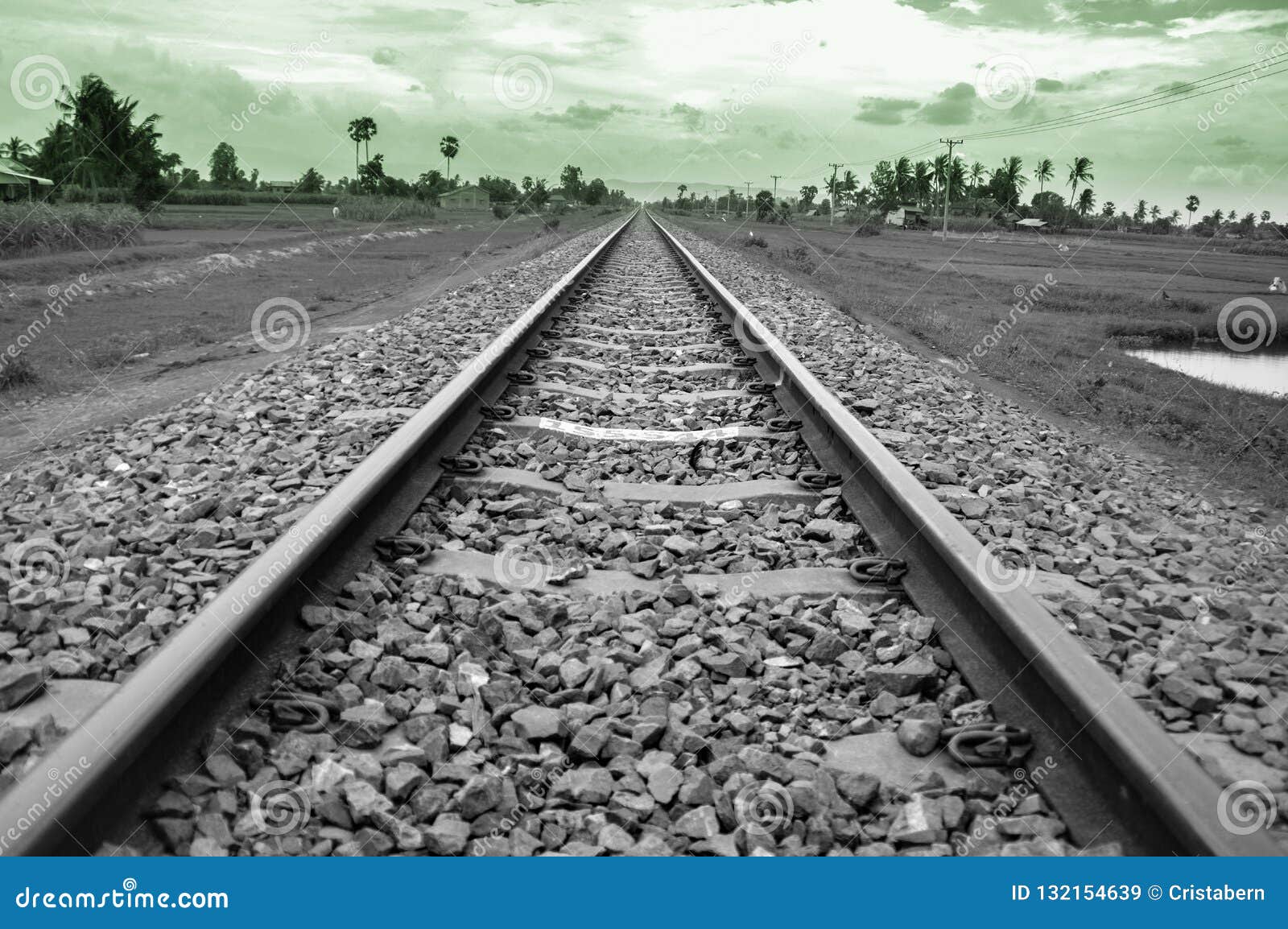 abandoned train railway leading forward in kampot, cambodia