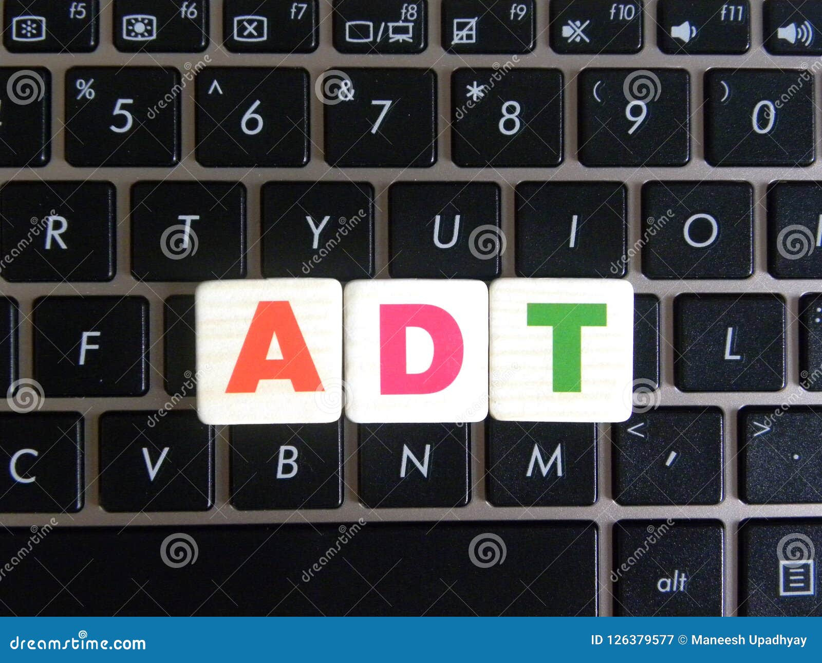 abbreviation adt on keyboard background