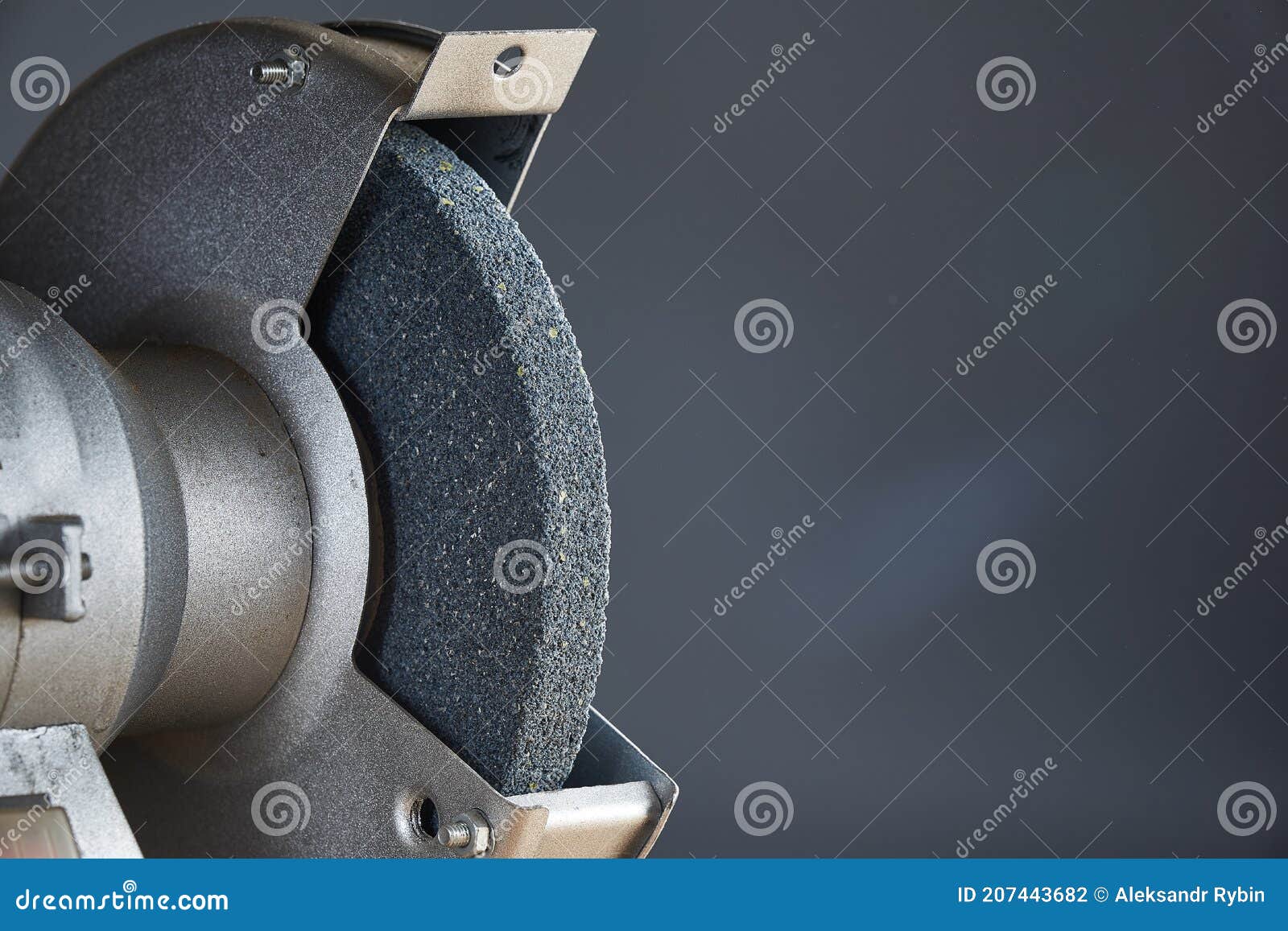 Abrasive Emery for Sharpening Tools Close Up on Gray Background. Stock