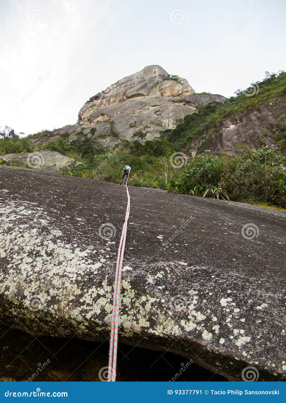 abseiling from dedo de deus mountain in brazil