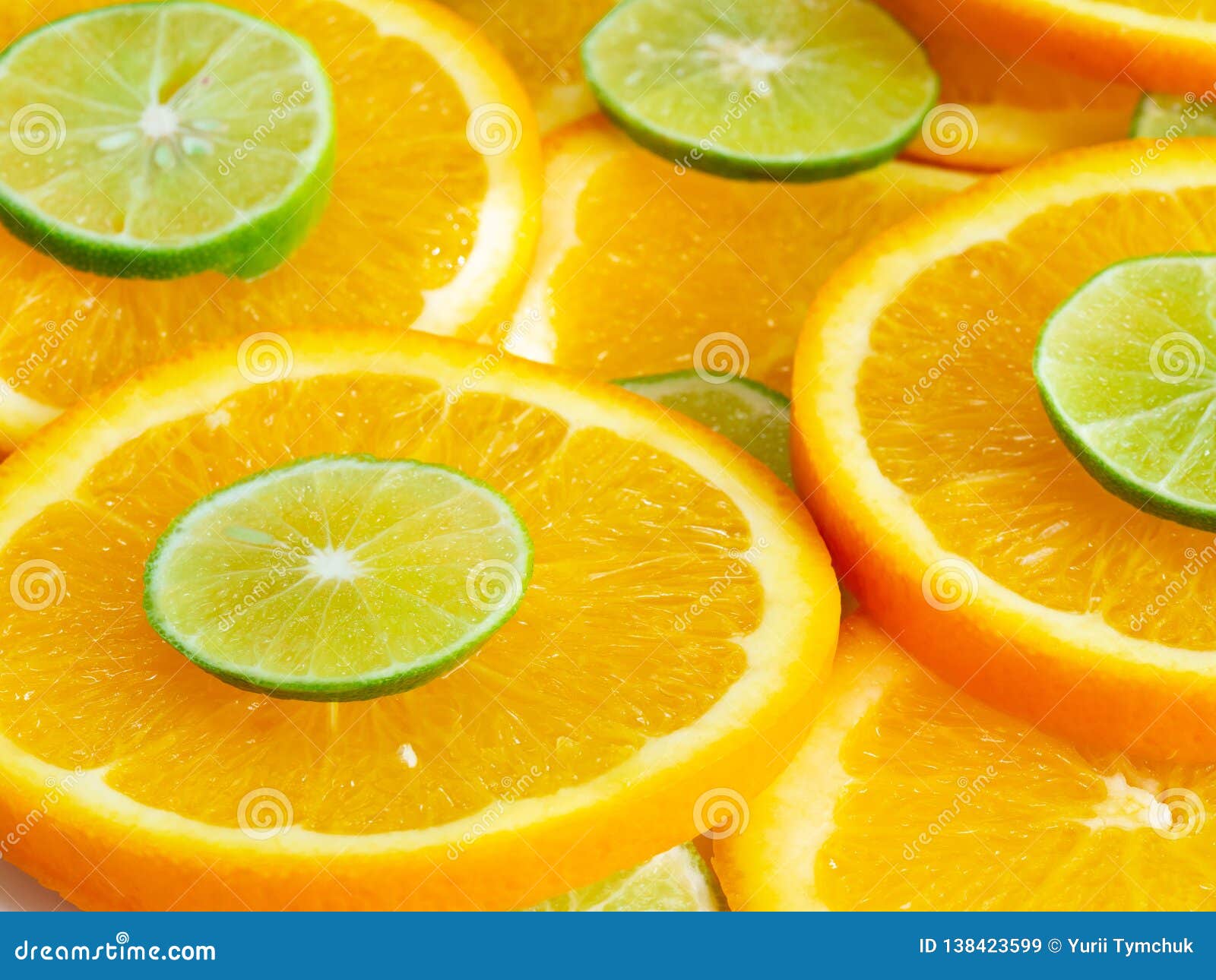 Abstract Background with Citrusfruit of Orange and Lime Slices. Close