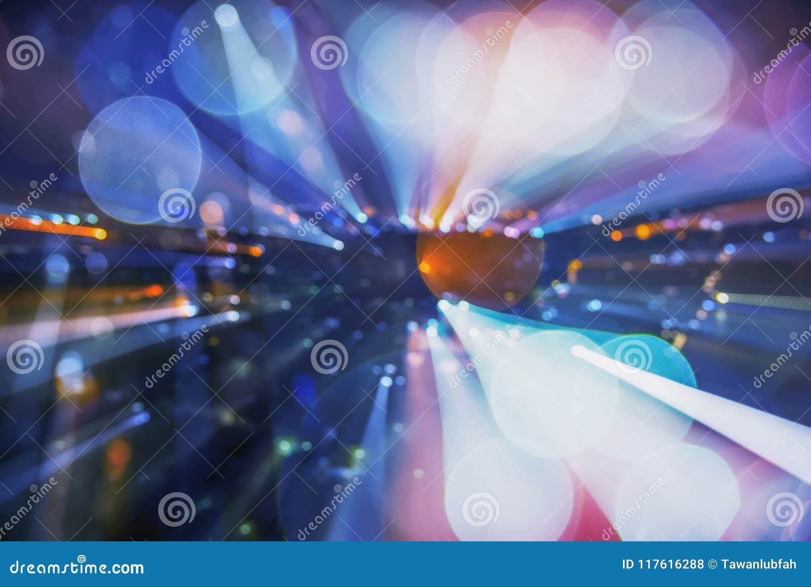 abstract background image of circular bokeh motion blurred street light background of city, traffic light from car on street at n