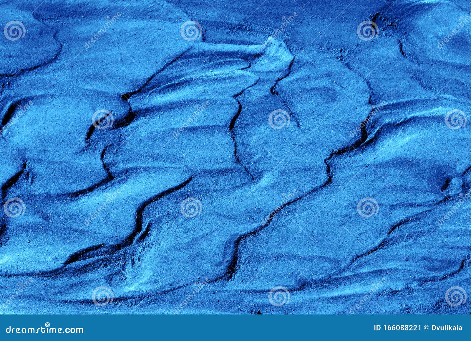 abstract texture of wet sand and clay toned
