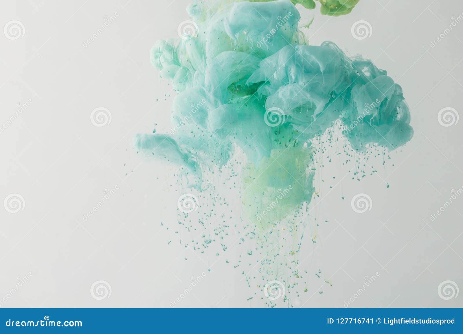 Abstract Background with Turquoise Paint Flowing in Water, Isolated on