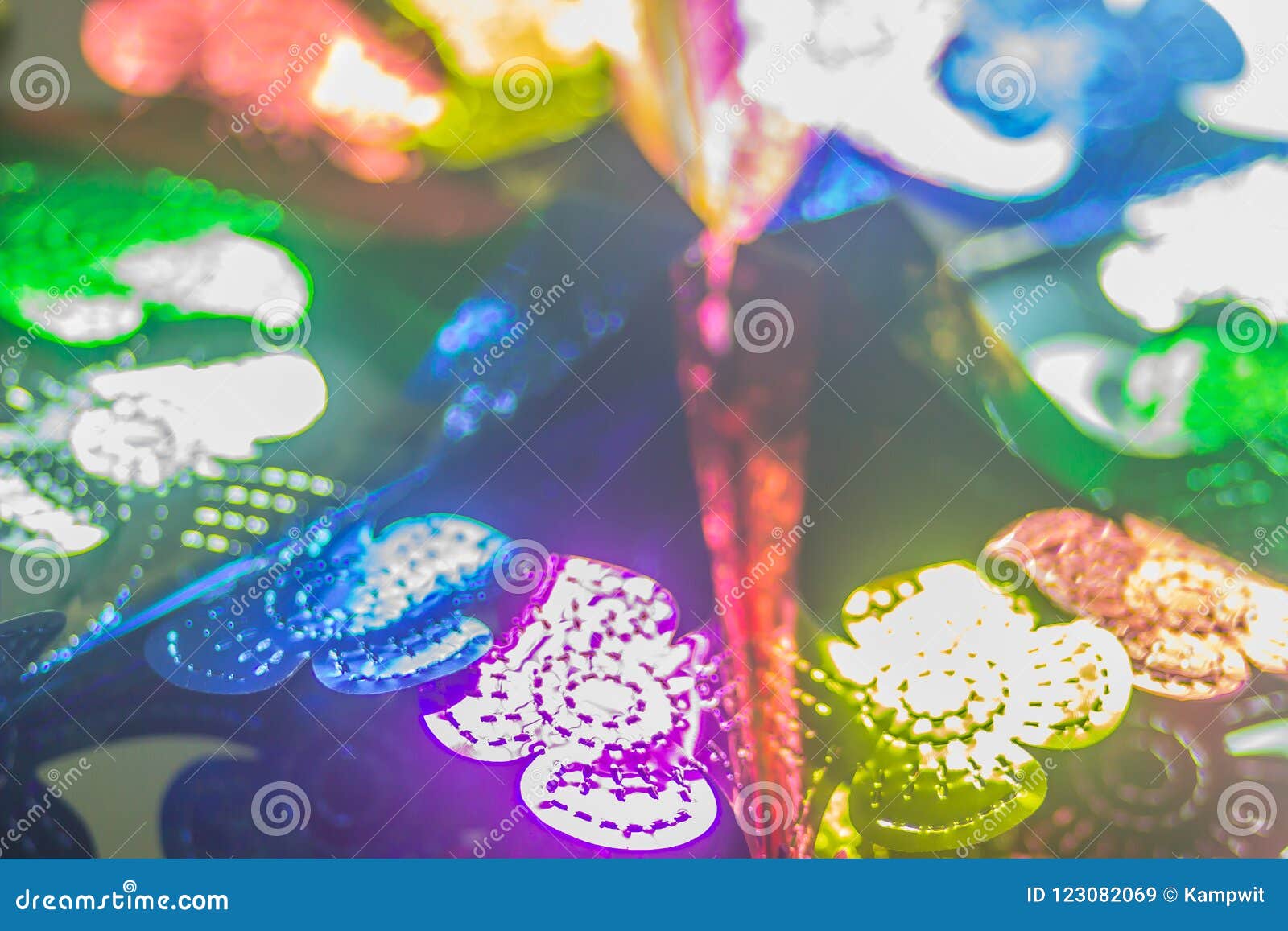 Abstract Blurred Colorful Garlands Are Hanging On The