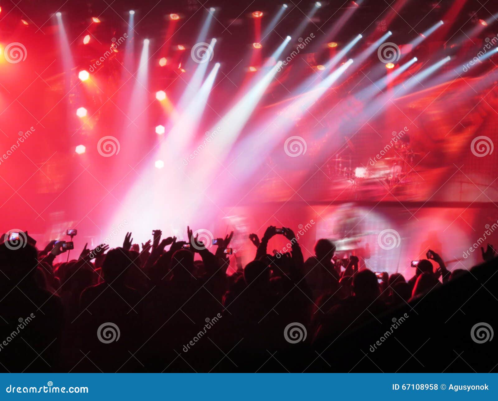 abstract blurred image. crowd during a entertainment public concert a musical performance. hand fans in fun zone people