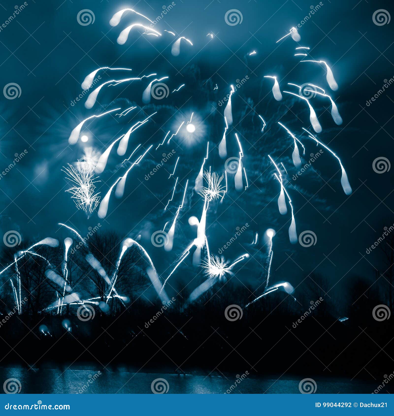 abstract, blurry, bokeh-style colorful photo of fireworks in a blue tone