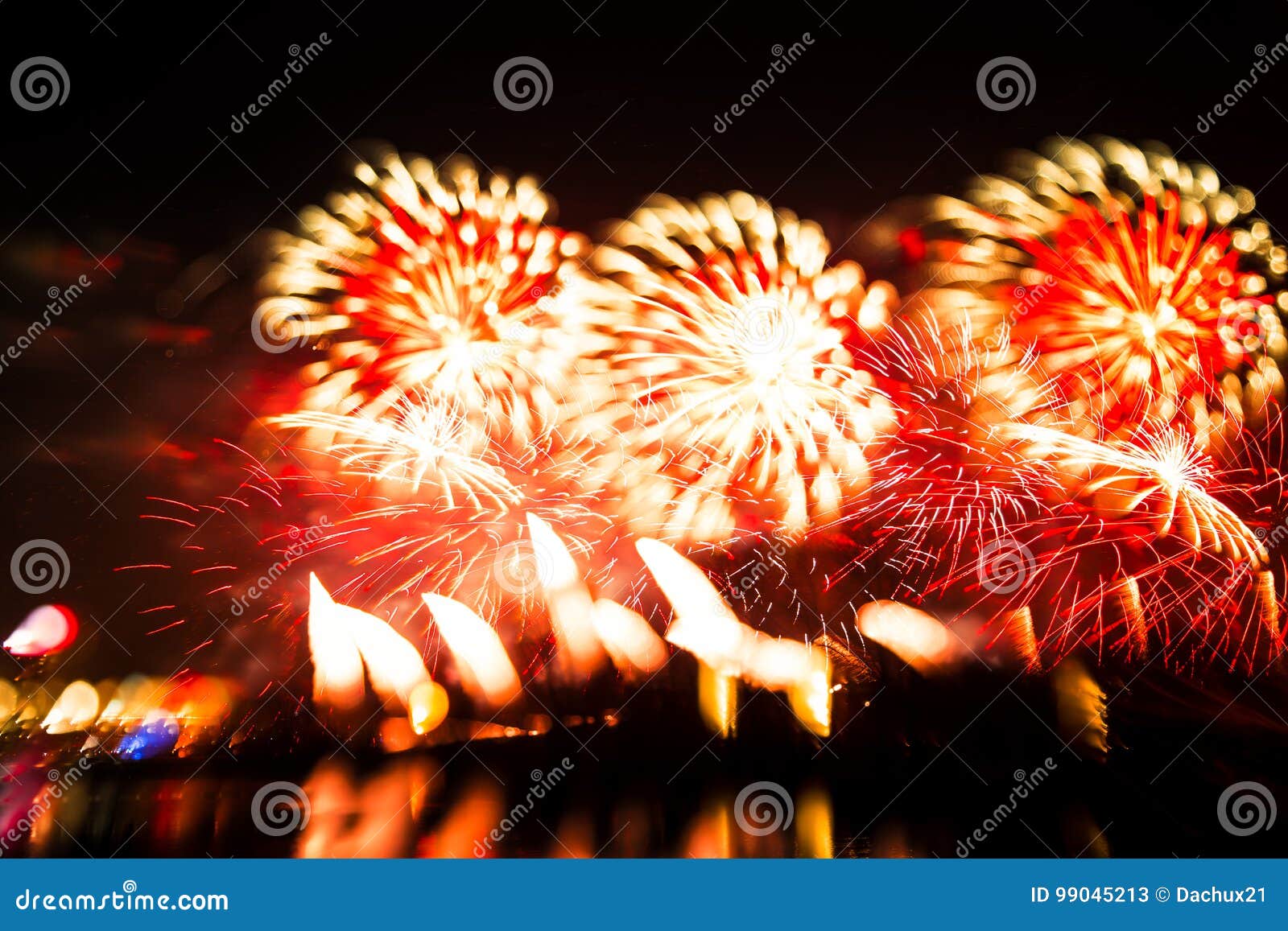 abstract, blurry, bokeh-style colorful photo of fireworks in a red tone