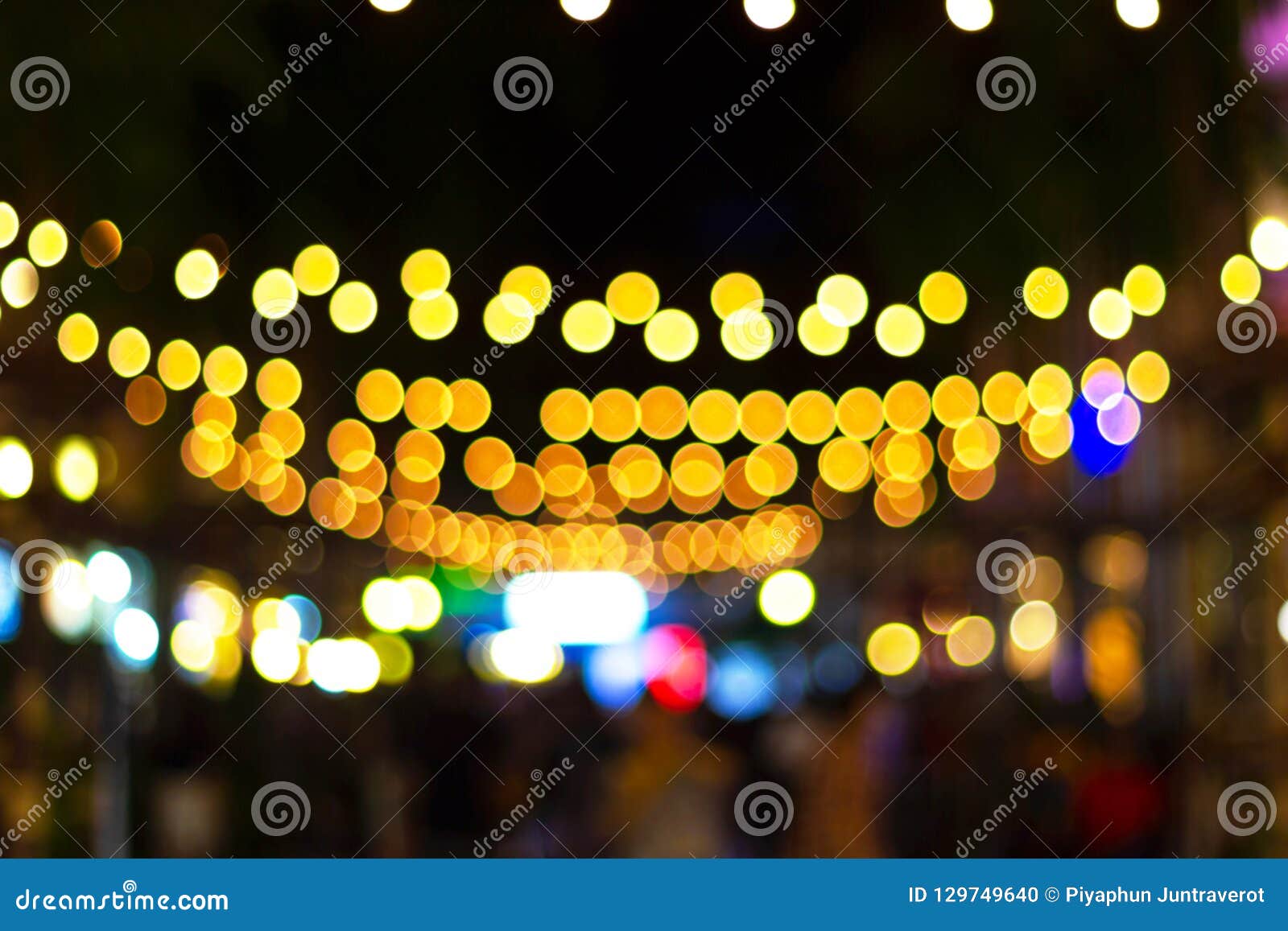 Abstract - Bokeh Decorative Outdoor String Lights Hanging on a Tree in ...