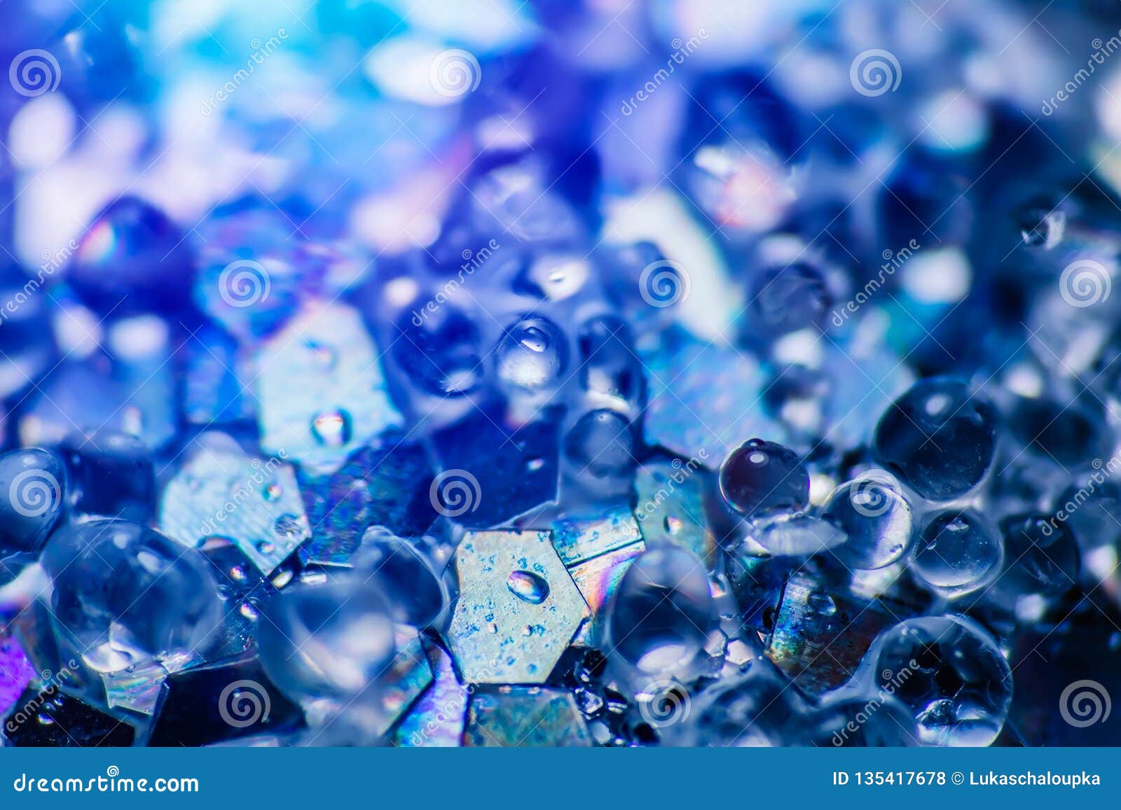 abstract colorful glitter background with small hexagon and stone, macro photo