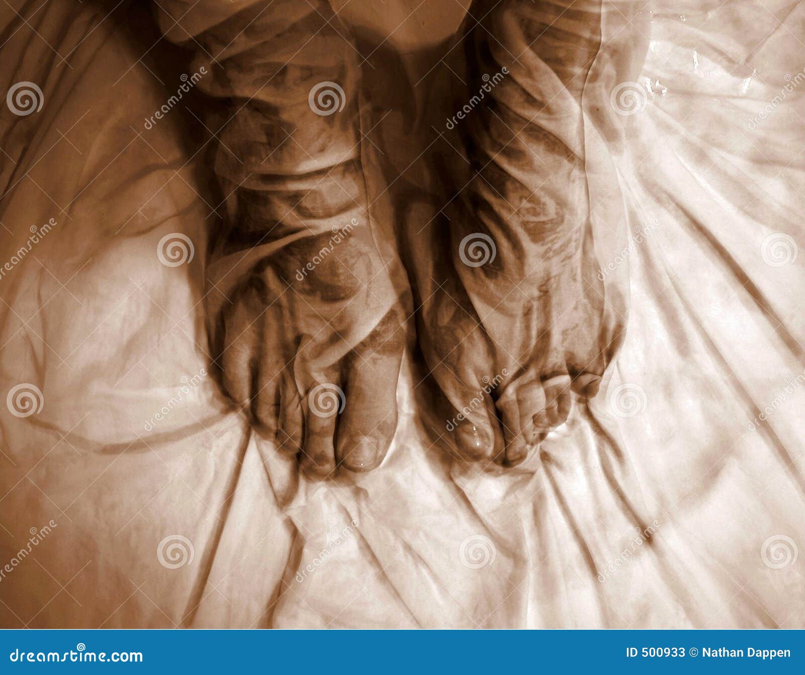 abstract female bare feet of cloth