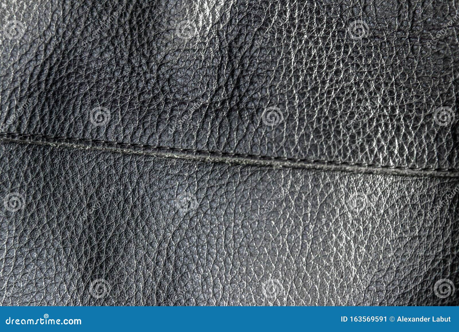 abstract genuine black leather texture background with stitch. close up view with copy space