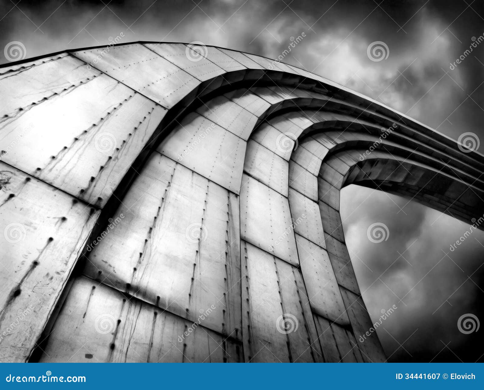 Abstract grand steel rainbow looking to the sky background