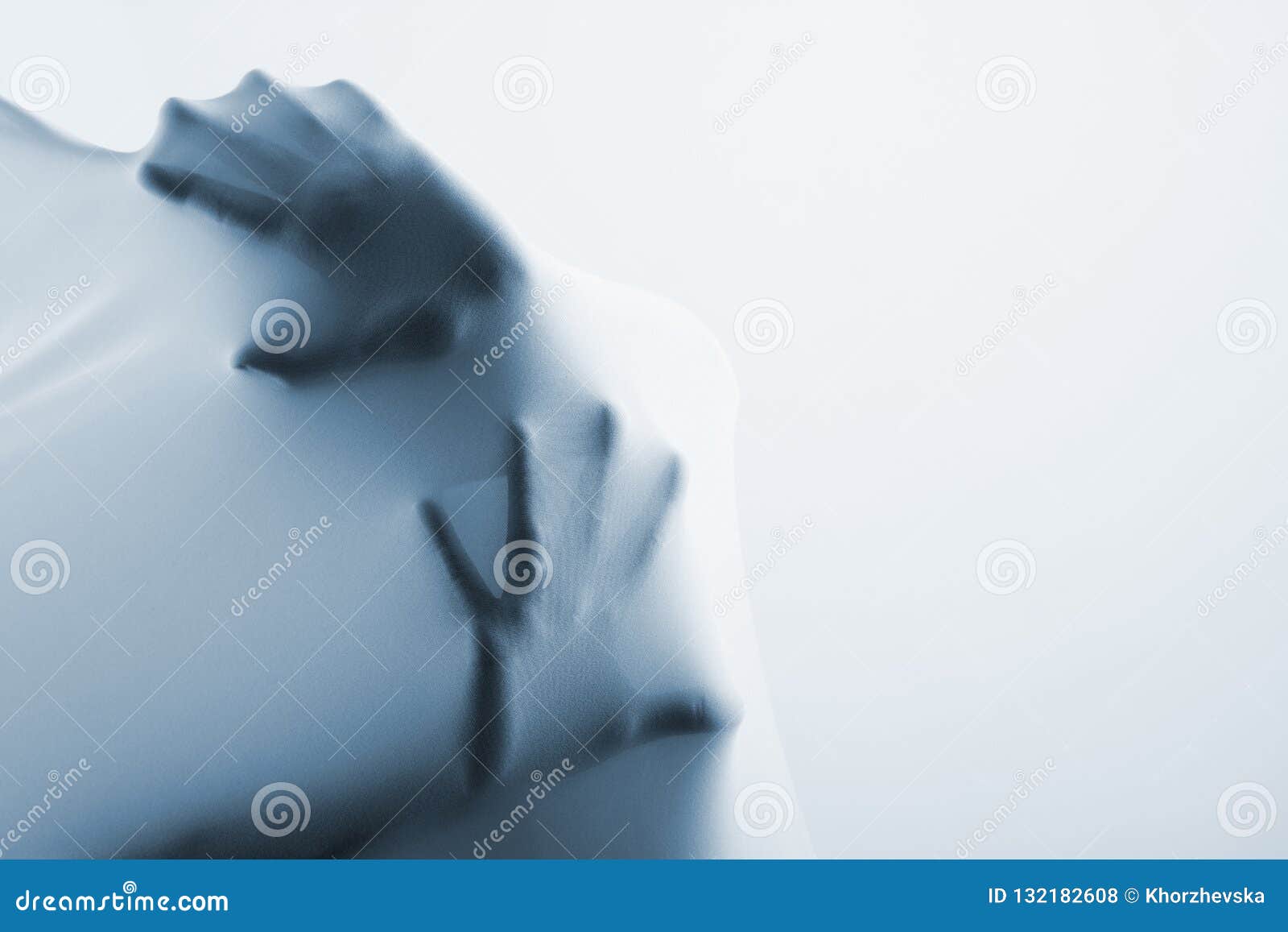 abstract hands, human arm inside fabric