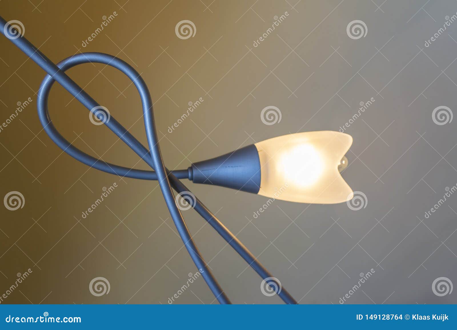 abstract lamp with gradient yellow and white background. artistic composition with shining lamp background  and steel