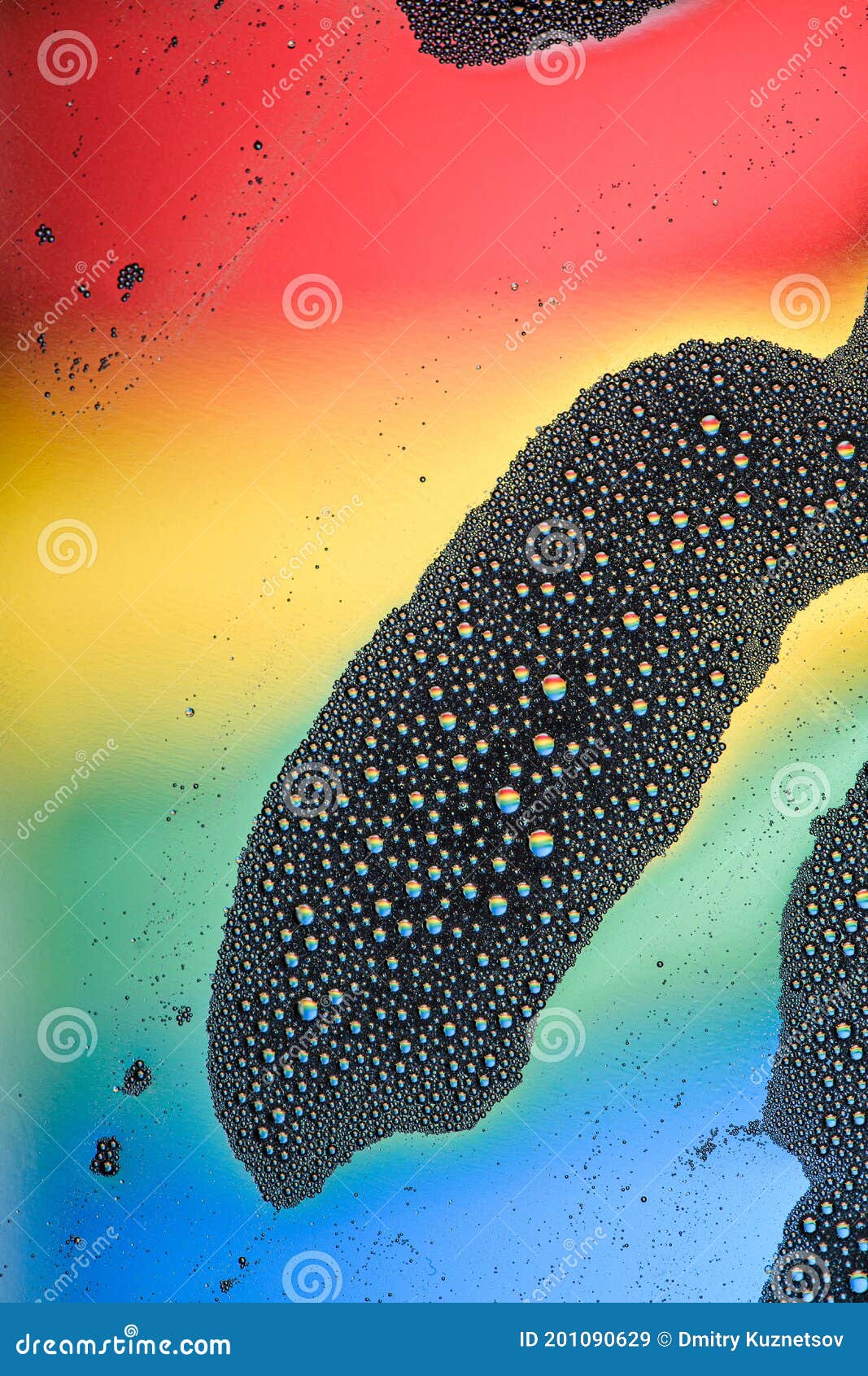 abstract macro photo of multiple reflections of the rainbow in foam
