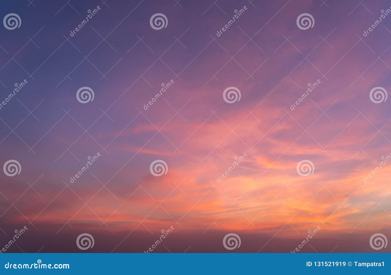 abstract nature background. dramatic blue sky with orange colorful sunset clouds in twilight time
