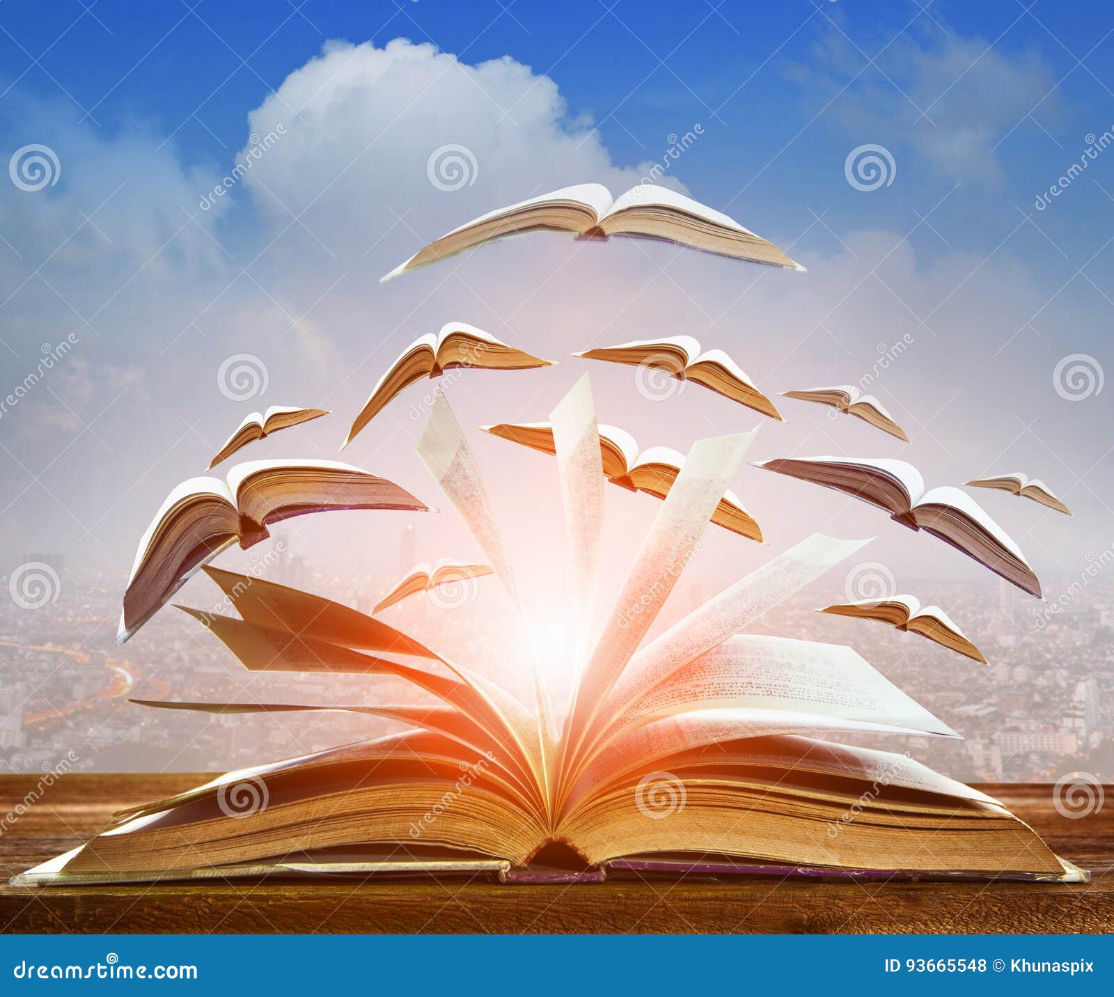 abstract of open book flying as knowledge wisdom going to future