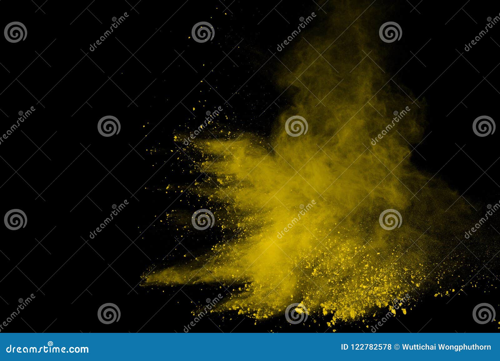 abstract of yellow powder explosion on black background. yellow powder splatted isolate. colored cloud. colored dust explode. pain
