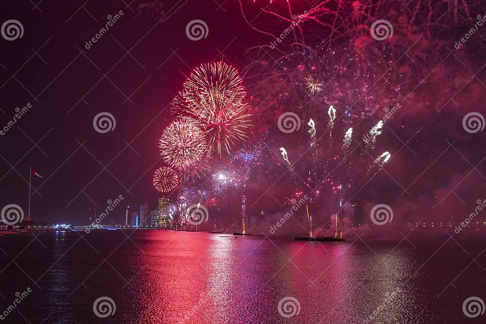 Abu Dhabi Skyline with Fireworks Lighting Up the Sky As Part of the