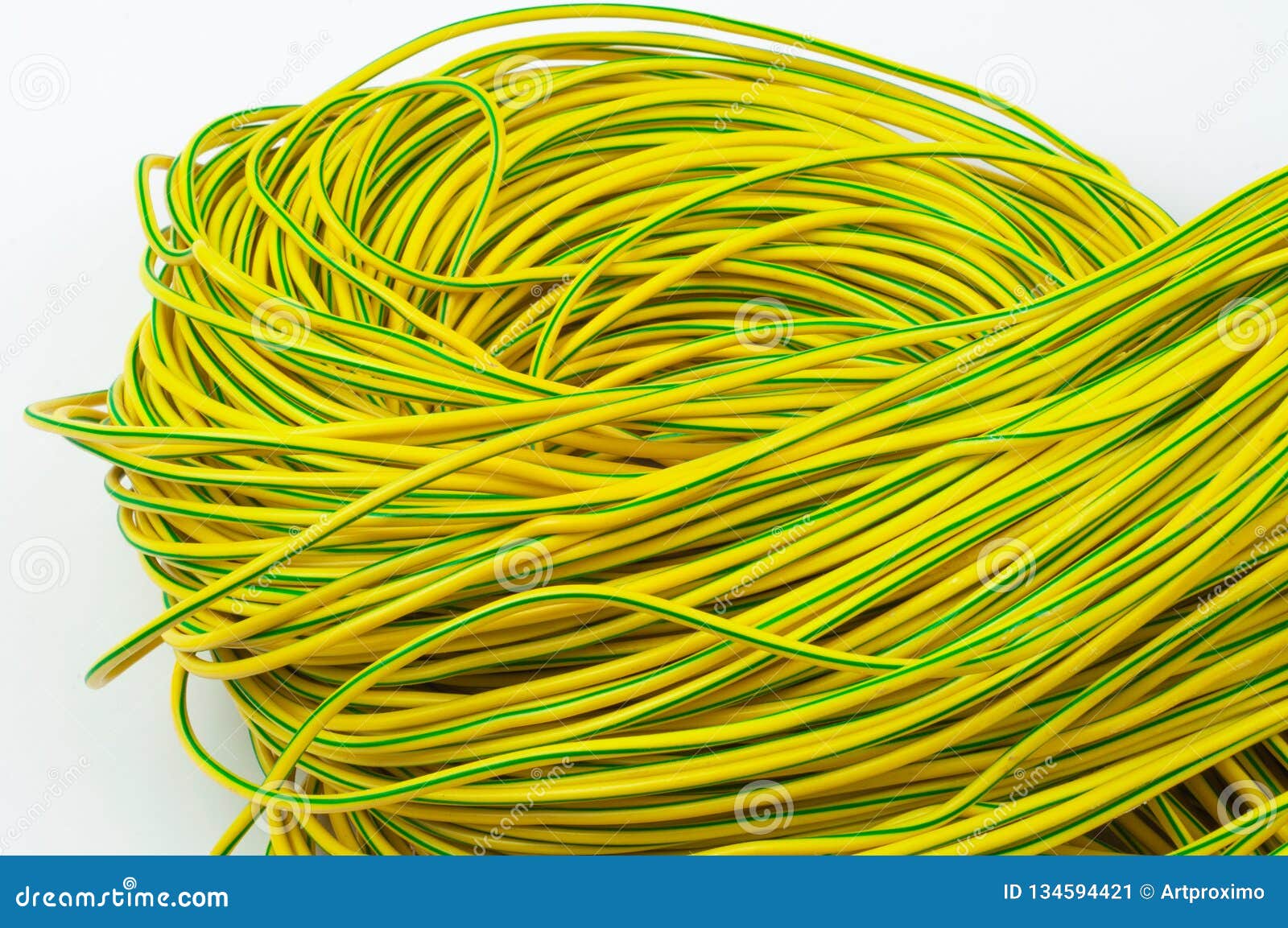Abundle of Copper Wire Yellow Green on a White Background Close Up