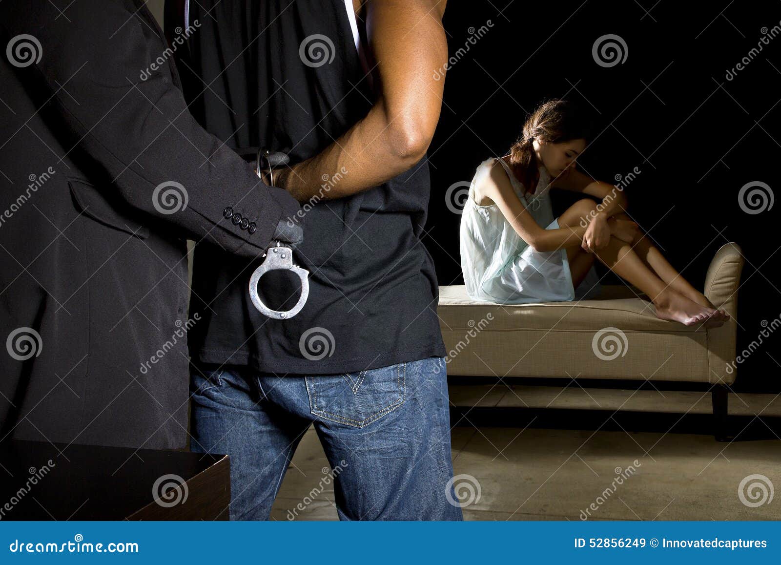 abusive man being arrested for domestic violence