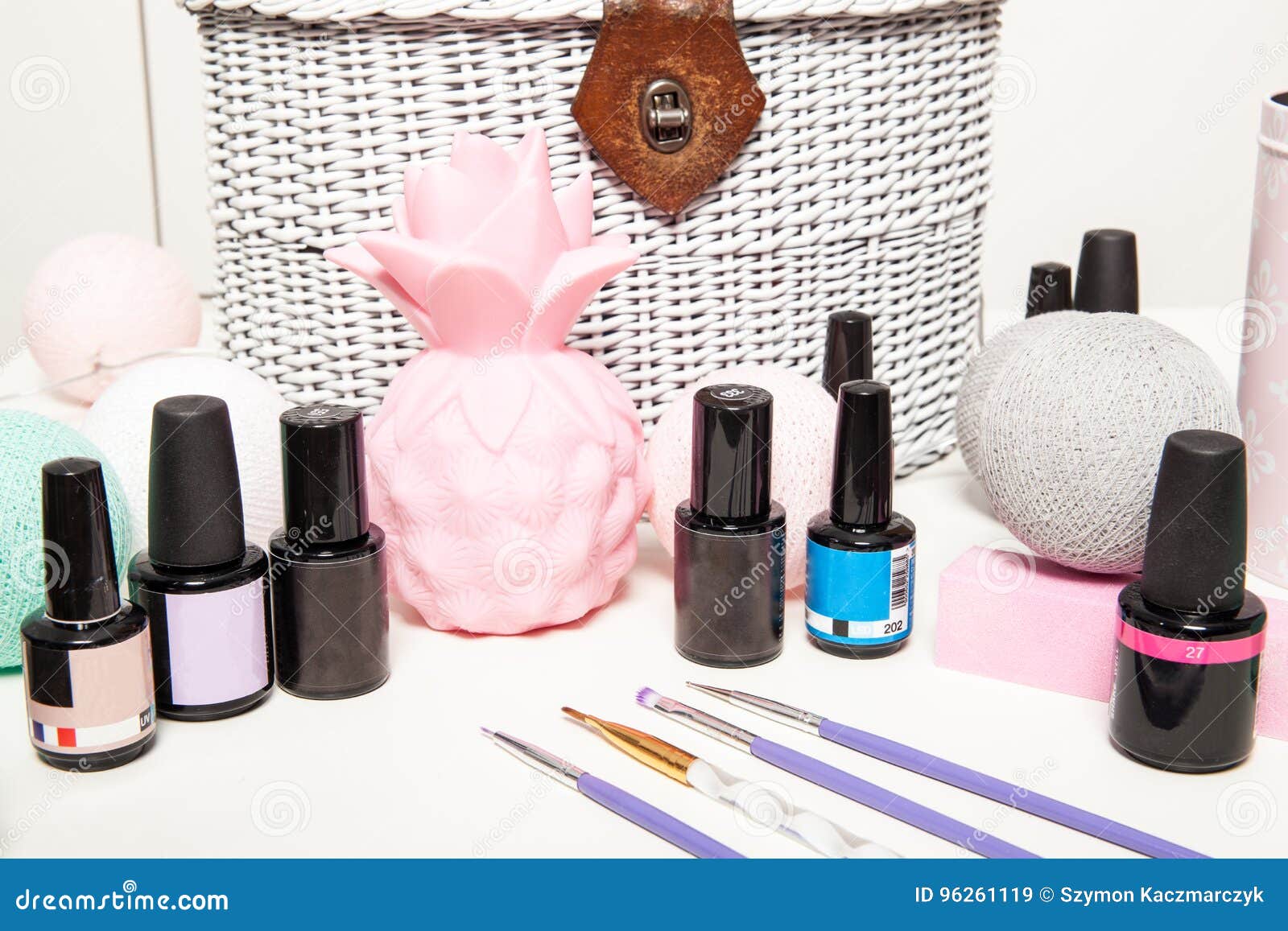 Accessories for Nail Decoration, Brushes and Varnishes on a White Table ...