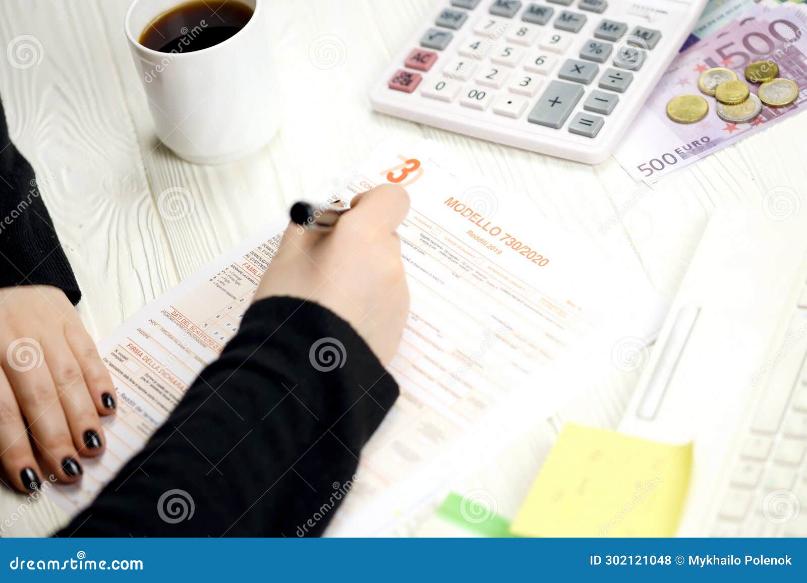 accountant fill italian tax form modello 730 individual income tax return in end of tax period. taxation and paperwork