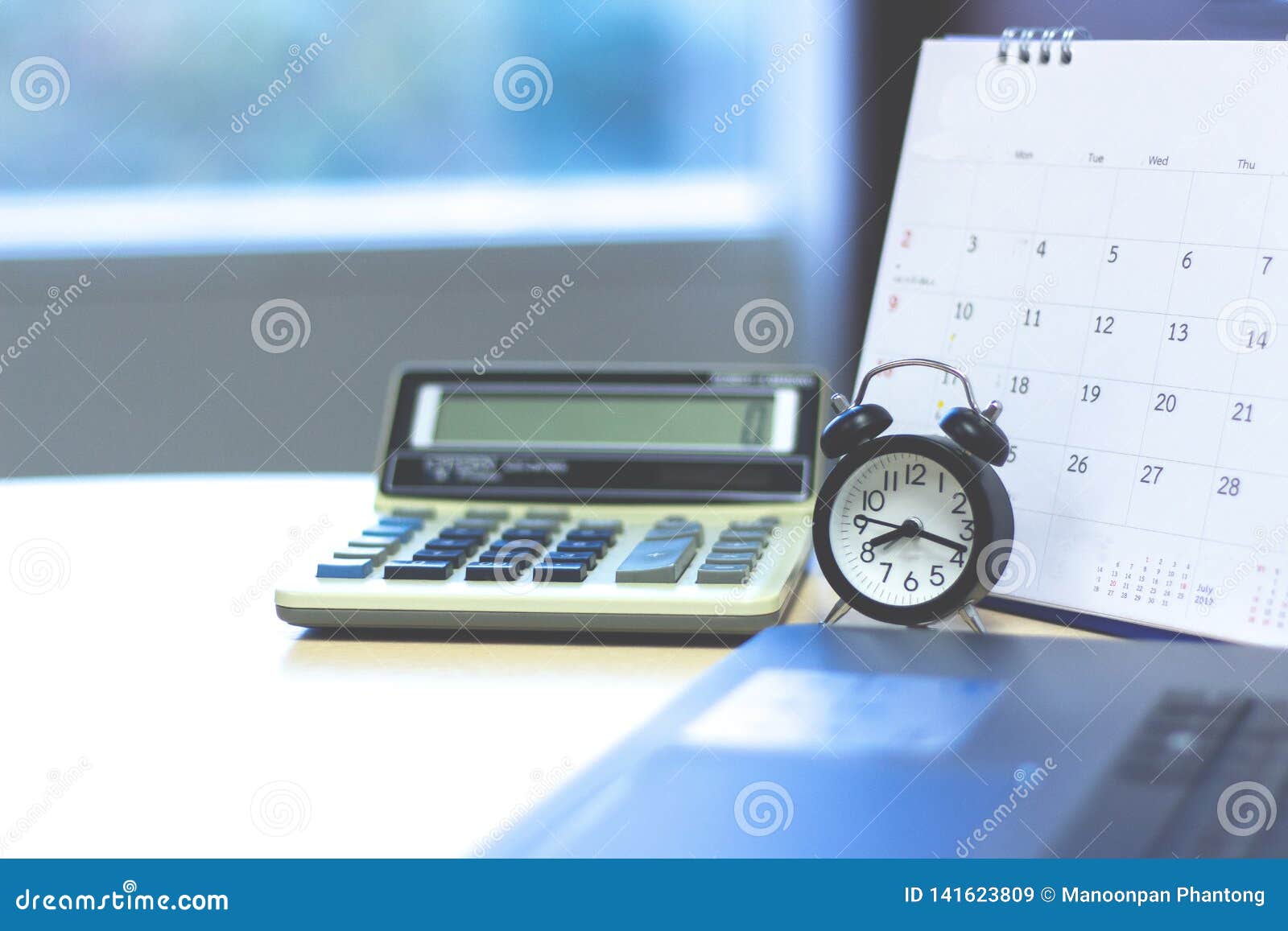 Accounting Business Concept. Calculator with Calendar and Clock Stock