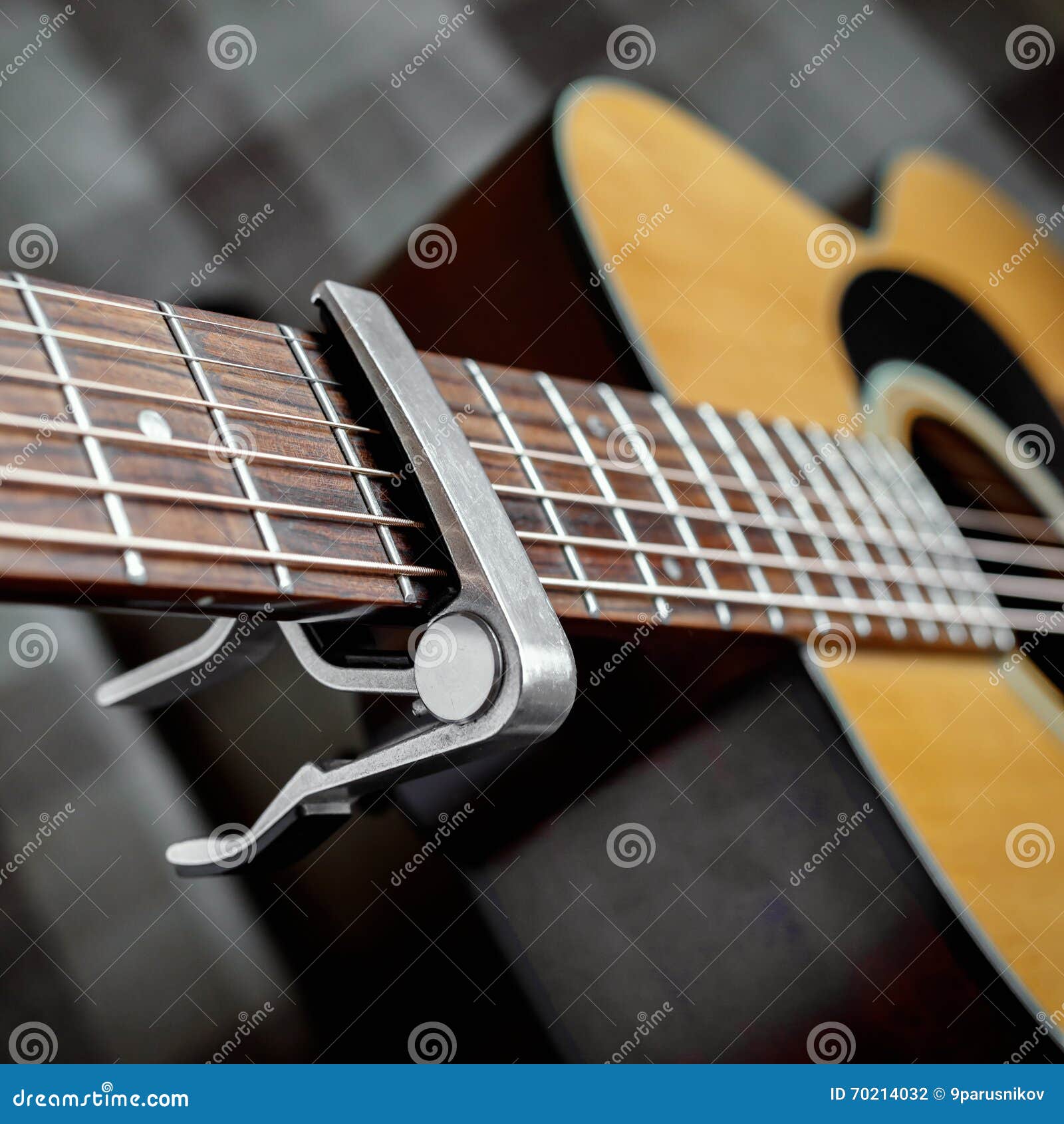 Acoustic Guitar Neck with a Capo Stock Photo Image of fret, body