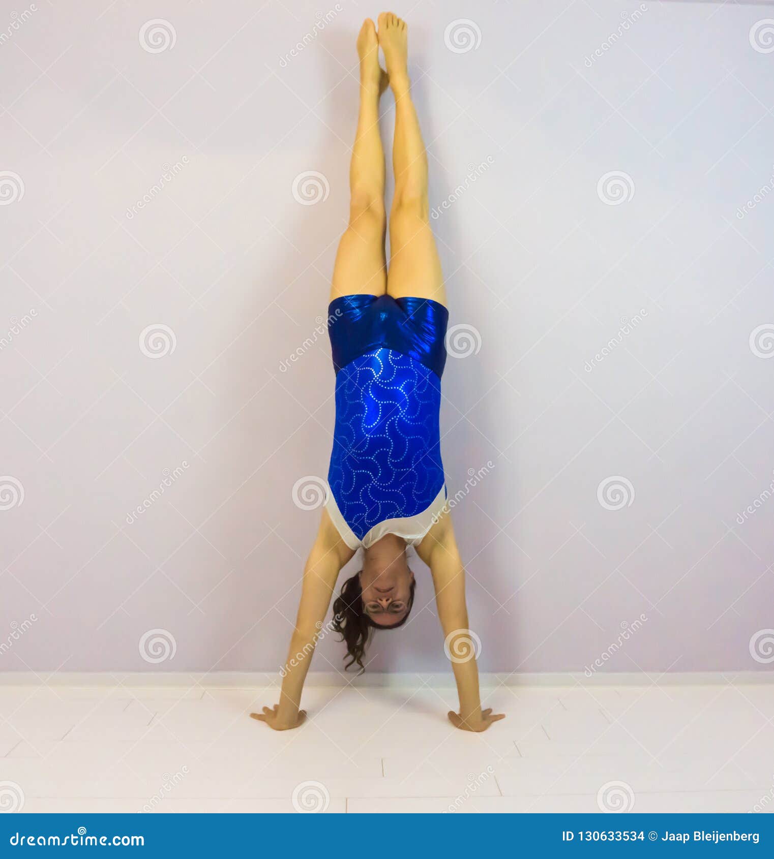 Acrobatic Gymnastics Young Transgender Girl Standing on Her Hands in ...