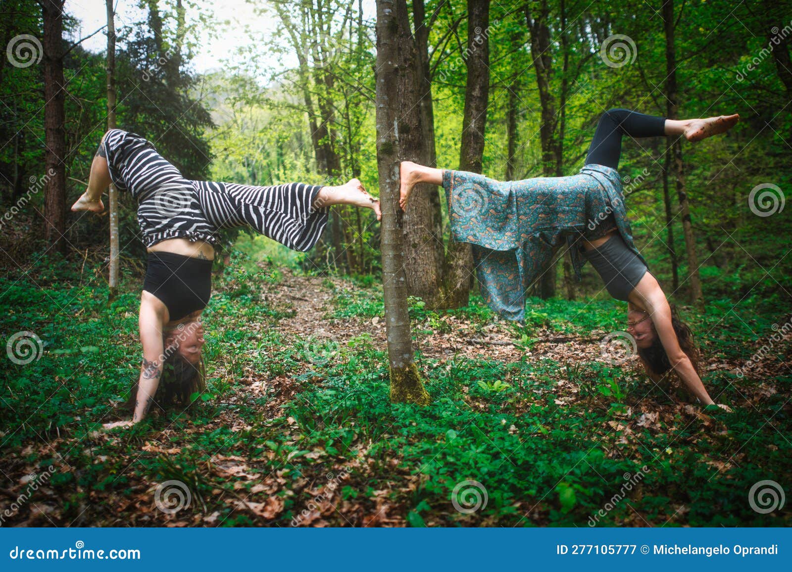 acrobatic yoga practiced by young female couple