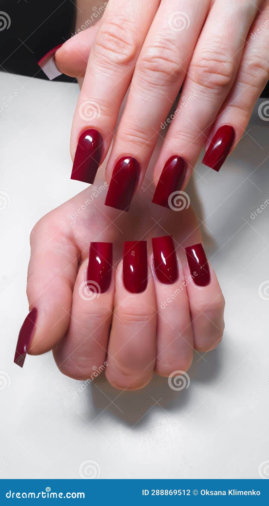 Acrylic Nail Extension, Manicure, Nail Correction, Hands in the Foreground. Bright Design Stock