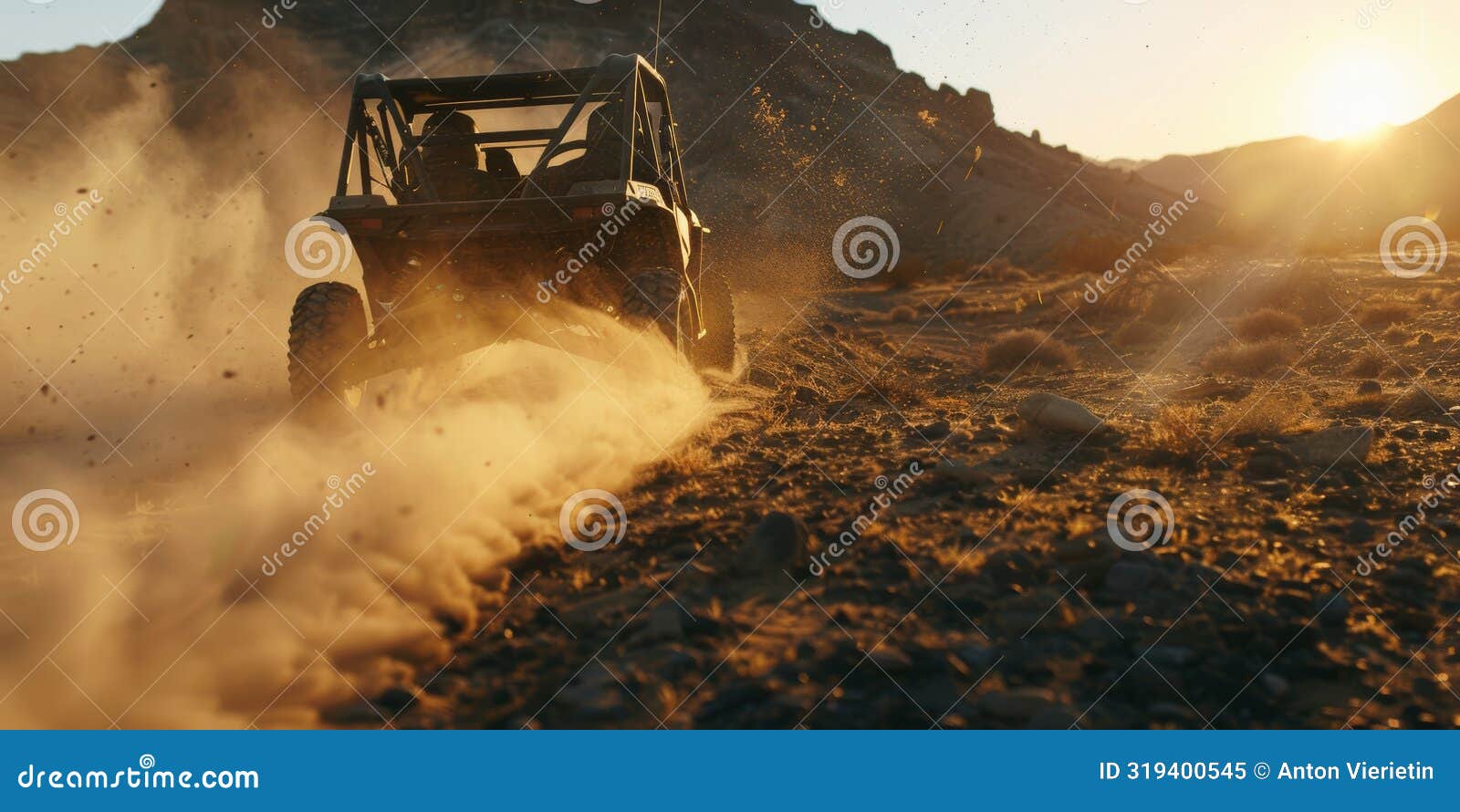 action shot features utv racing through desert environment, its tires churning up sand and dirt shows power and agility.