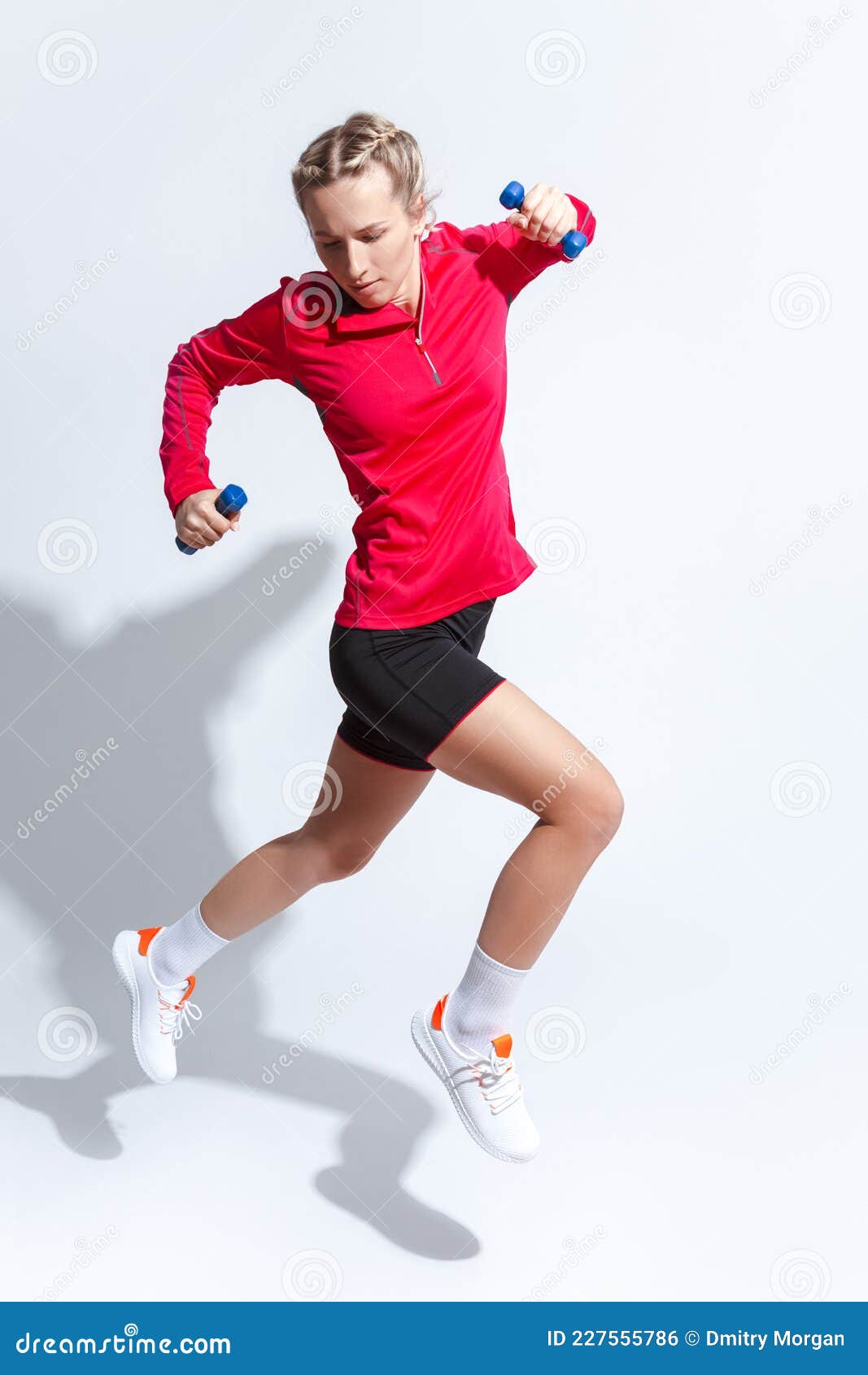 Active Caucasian Female in Red Long Sleeve Jersey and Jogging