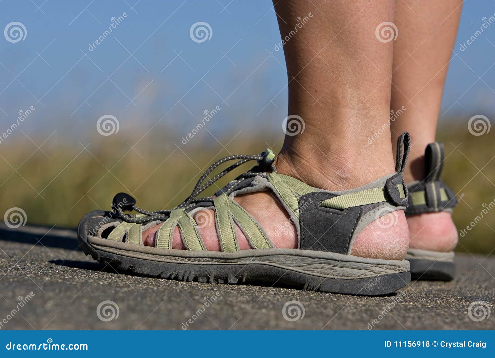active feet wearing sports beach sandals