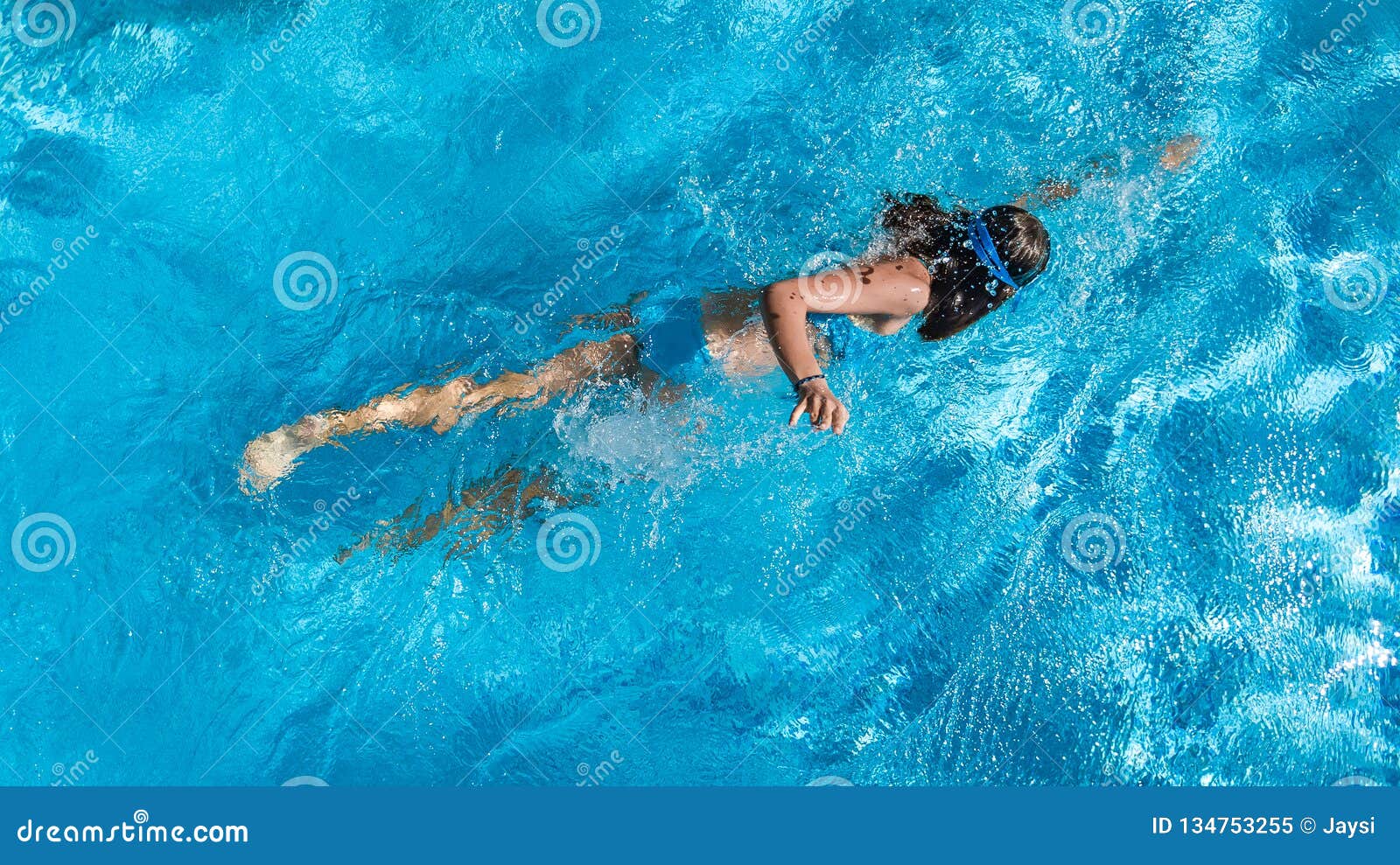 Active Girl In Swimming Pool Aerial Drone View From Above 
